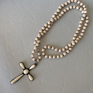 Beautiful beaded cross necklace in cream hand made 17 1/2” long.